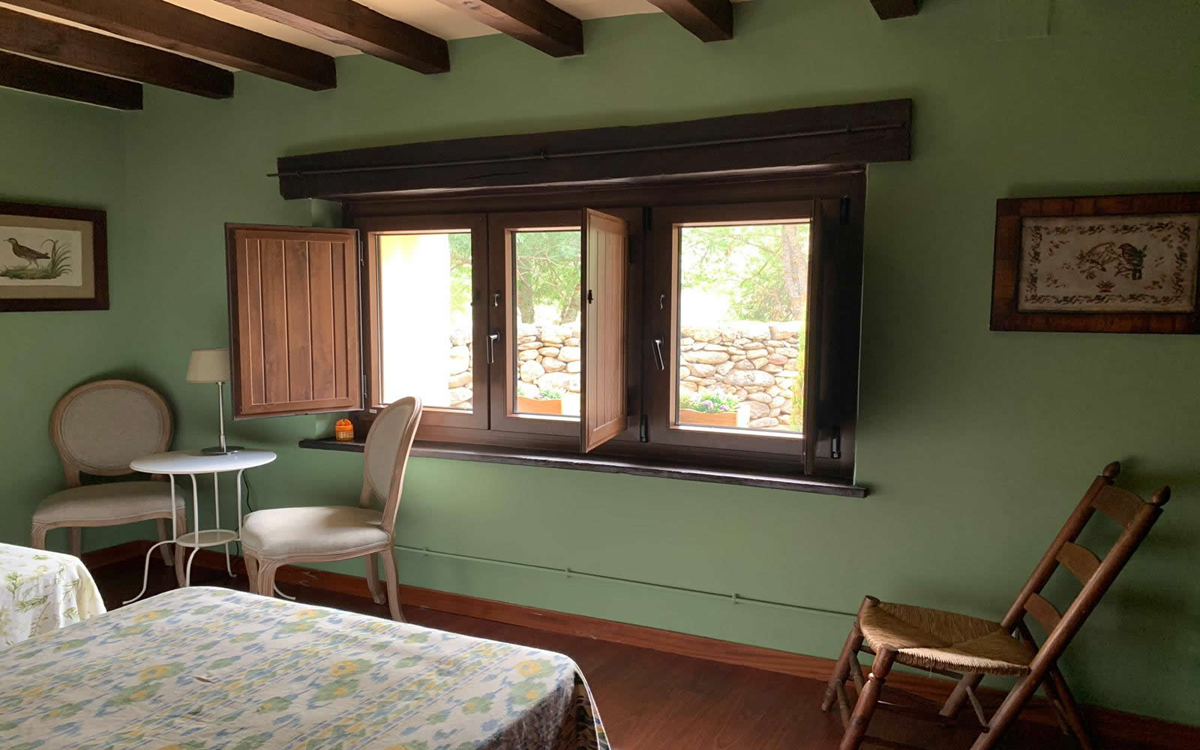 Casa rural El Molino de las Eras en Alameda del Valle, alquiler de habitaciones con baño y calefacción con cocina y salón